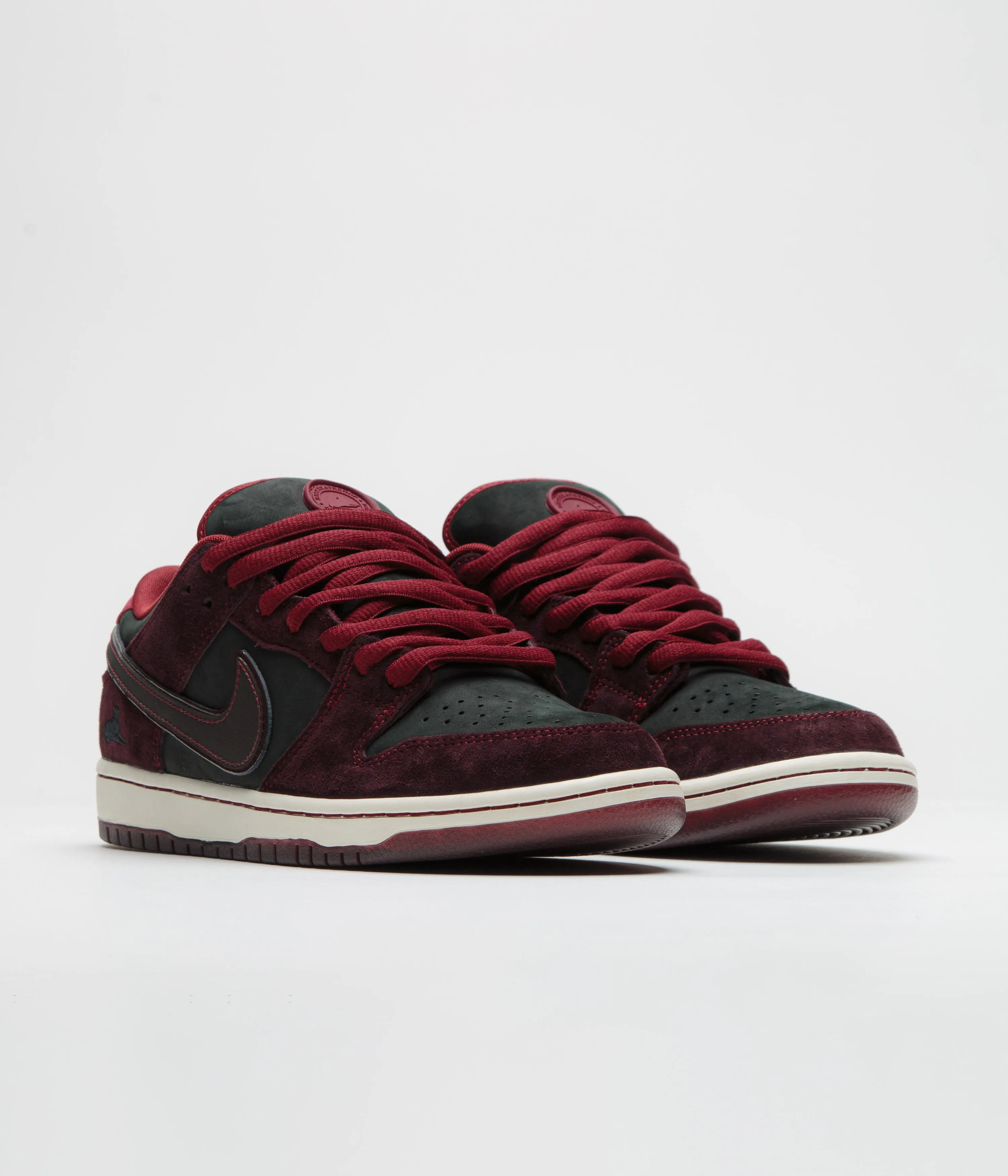 Nike SB x RIOT Skateshop Dunk Low Pro Shoes - Mahogany / Dark Beetroot - Team Red - Sail Nike SB Clothing