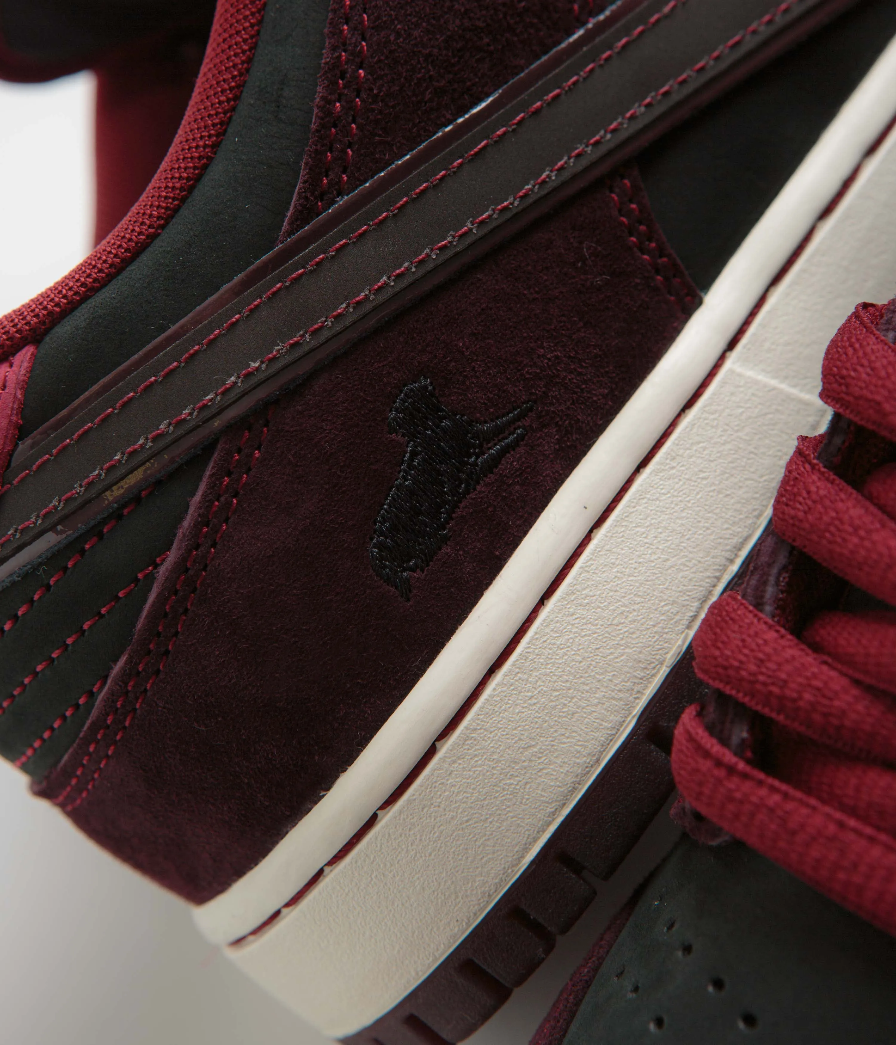 Nike SB x RIOT Skateshop Dunk Low Pro Shoes - Mahogany / Dark Beetroot - Team Red - Sail Nike SB Clothing