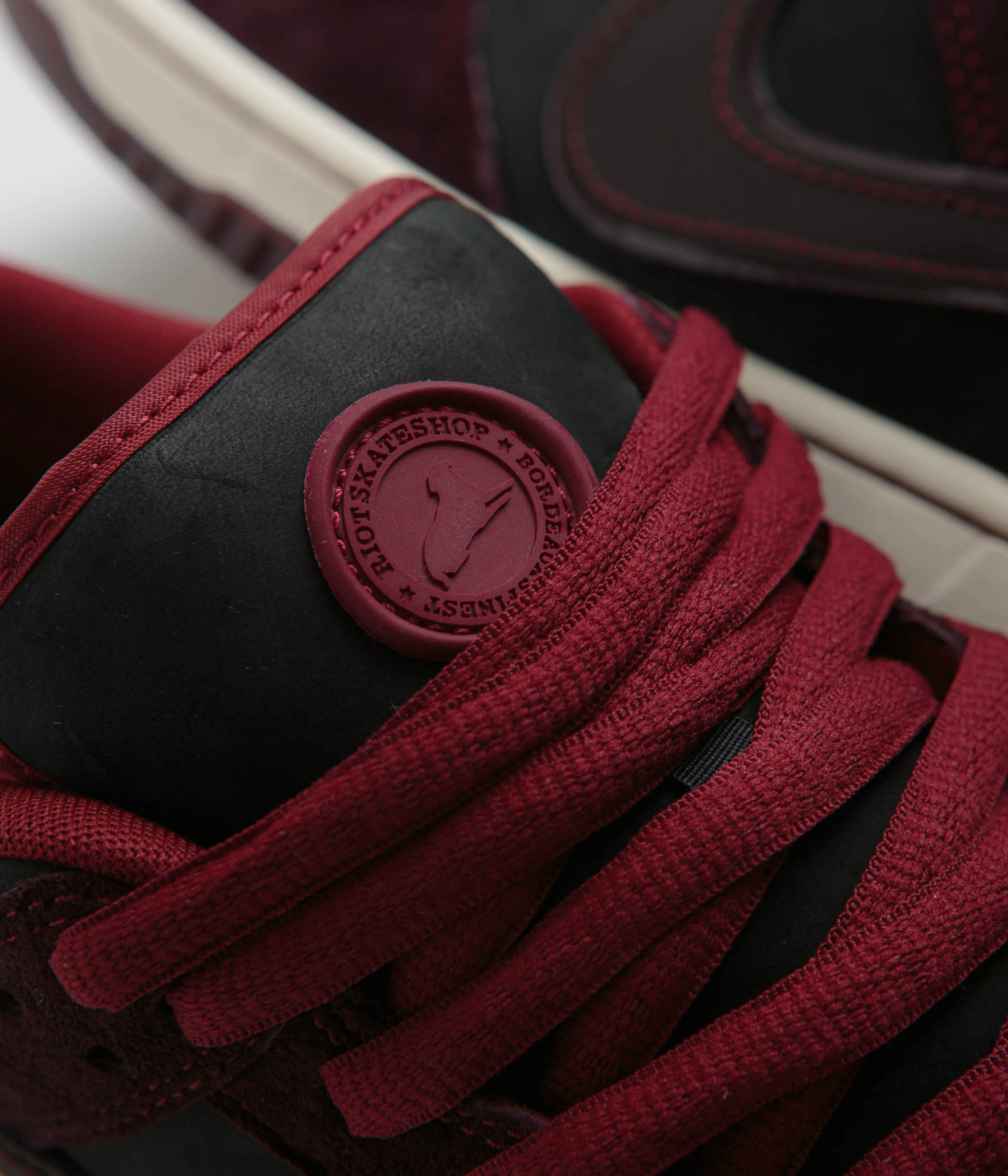 Nike SB x RIOT Skateshop Dunk Low Pro Shoes - Mahogany / Dark Beetroot - Team Red - Sail Nike SB Clothing
